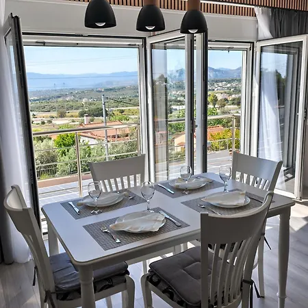 Sunny Loutraki Is A Modern With Views Of The Bay And Mountains With Private Parking